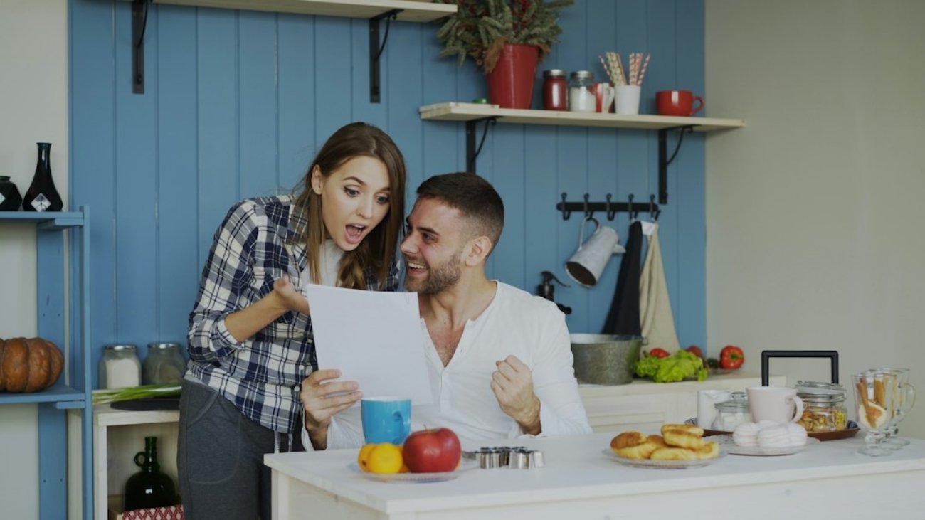 couple-reviewing-paperwork-home