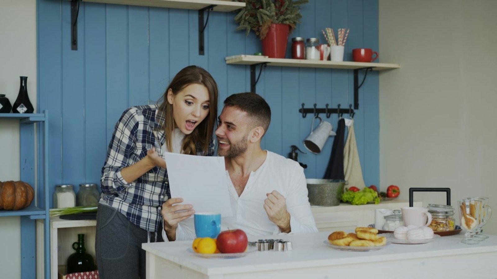 couple-reviewing-paperwork-home